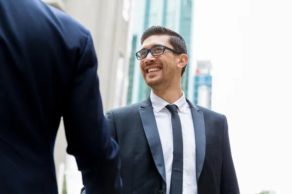 Two businessmen shaking their hands — Stock Photo, Image