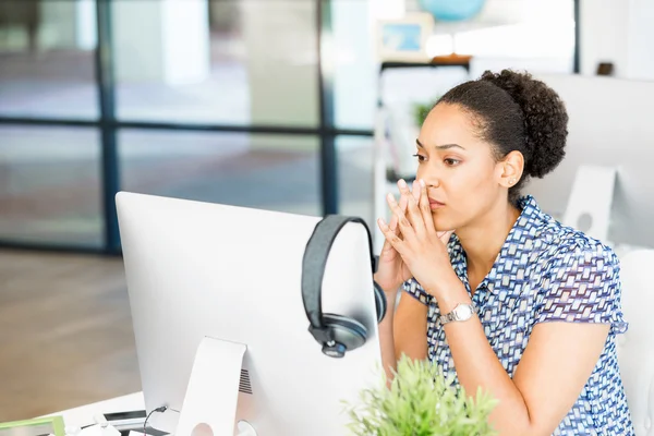 Portrait of tired afro-american office worker sitting in offfice — Stock Photo, Image