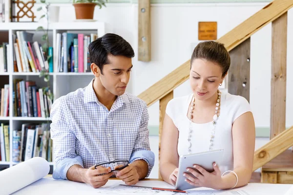 Two young architects in office — Stock Photo, Image