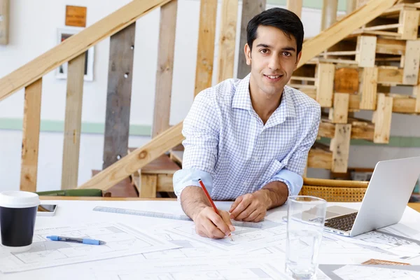 Young man architect in office — Stock Photo, Image