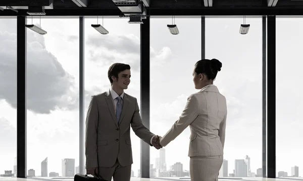 Obchodní partneři handshake. Kombinovaná technika — Stock fotografie