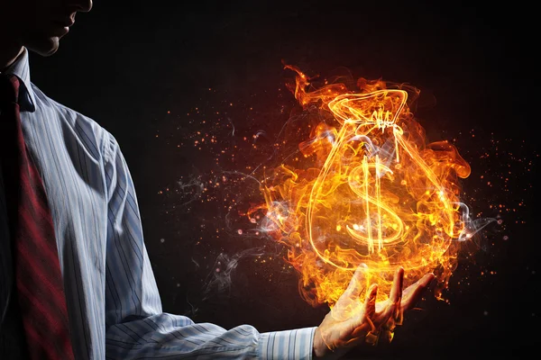 Dollar symbol in fire . Mixed media — Stock Photo, Image