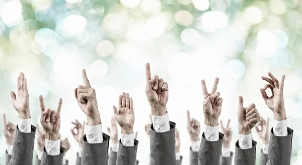 Group of people with raised hands — Stock Photo, Image