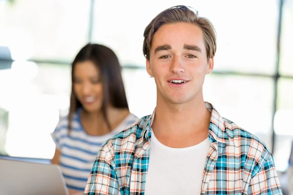 Young man working in office — Stock Photo, Image