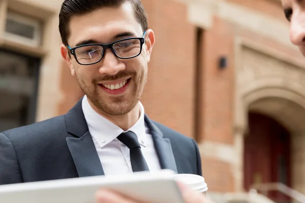 Two businessmen talking outdoors — Stock Photo, Image