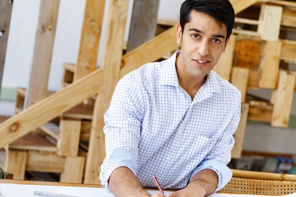 Young man architect in office — Stock Photo, Image