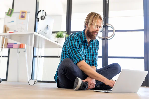 Young man working in office — Stock Photo, Image