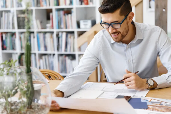 Young man architect in office — Stock Photo, Image