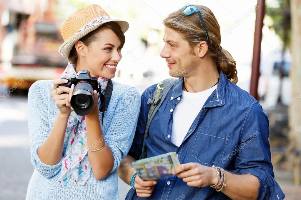 Smiling couple with the camera