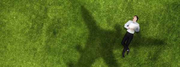 Airplane shadow on green field — Stock Photo, Image