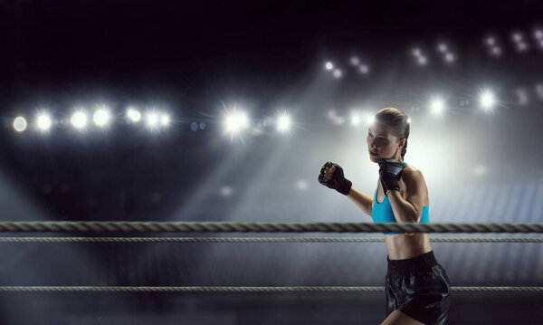 Young woman boxing. . Mixed media