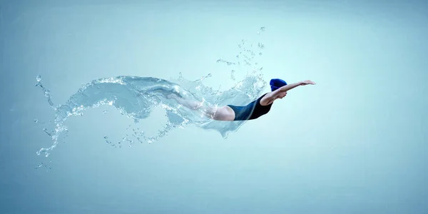 Professional woman swimmer on a wave — Stock Photo, Image