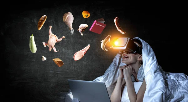 Woman with laptop submerged into virtual reality . Mixed media . Mixed media — Stock Photo, Image