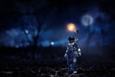 Astronaut walking on an unexplored planet clipart
