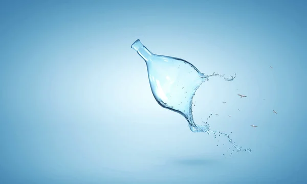 Water splash out of glass bottle — Stock Photo, Image