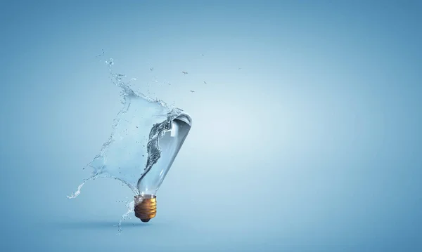 Light bulb from water splash — Stock Photo, Image