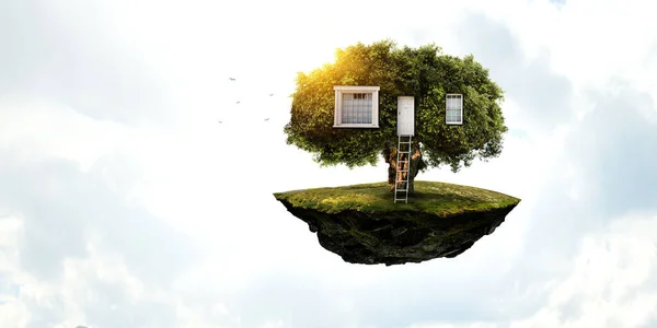 Little Eco House on the green grass . Mixed media — Stock Photo, Image