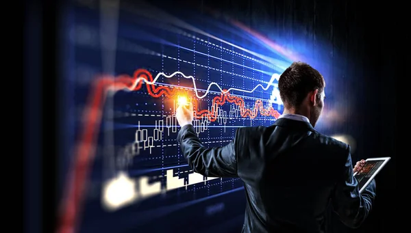 Business graph and trade monitor . Mixed media — Stock Photo, Image