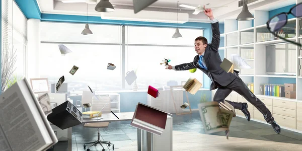 Feliz hombre de negocios saltando alto. Medios mixtos —  Fotos de Stock