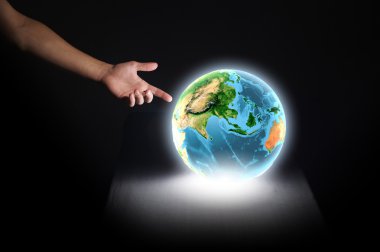 Human hand touching Earth planet with finger clipart