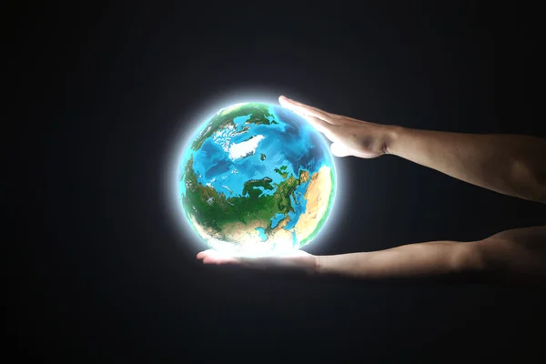 Human hand holding Earth planet — Stock Photo, Image