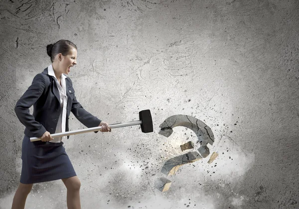 Businesswoman crashing question symbol — Stock Photo, Image