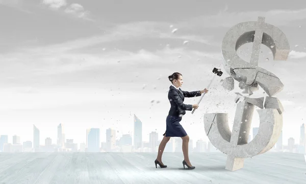 Businesswoman crashing dollar symbol — Stock Photo, Image