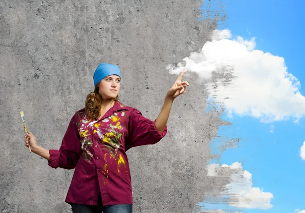 Painter with brush wearing bandana — Stock Photo, Image