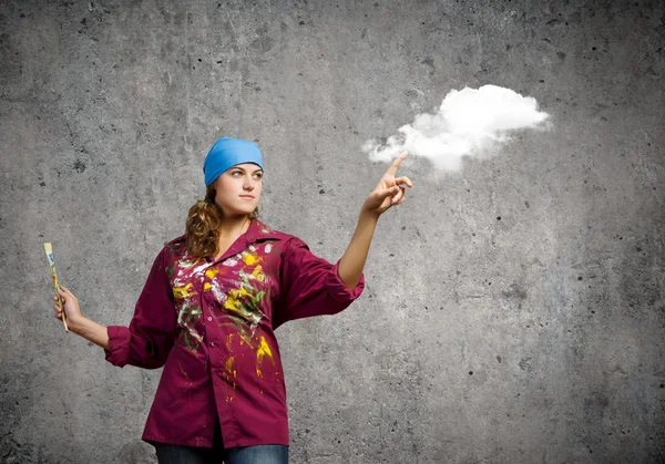 Painter with brush wearing bandana — Stock Photo, Image