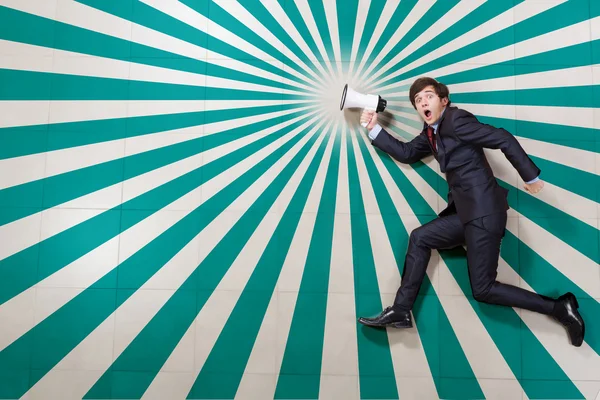 Businessman with megaphone — Stock Photo, Image