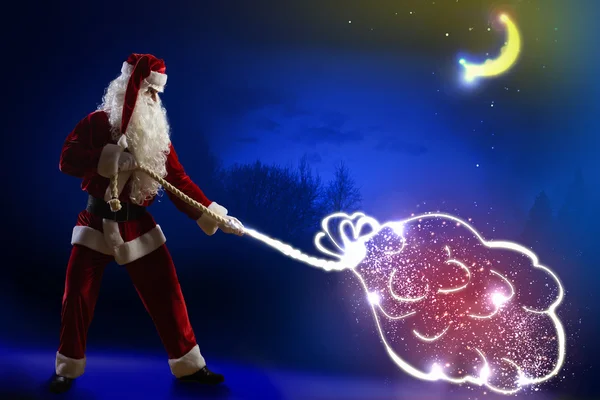 Santa Claus con bolsa de regalos — Foto de Stock