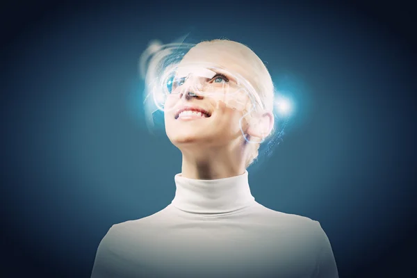 Woman with hologram round head — Stock Photo, Image