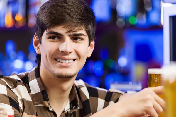 Man sitting at bar — Stock Photo, Image