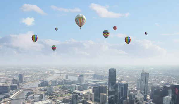 Balloons flying high in sky — Stock Photo, Image