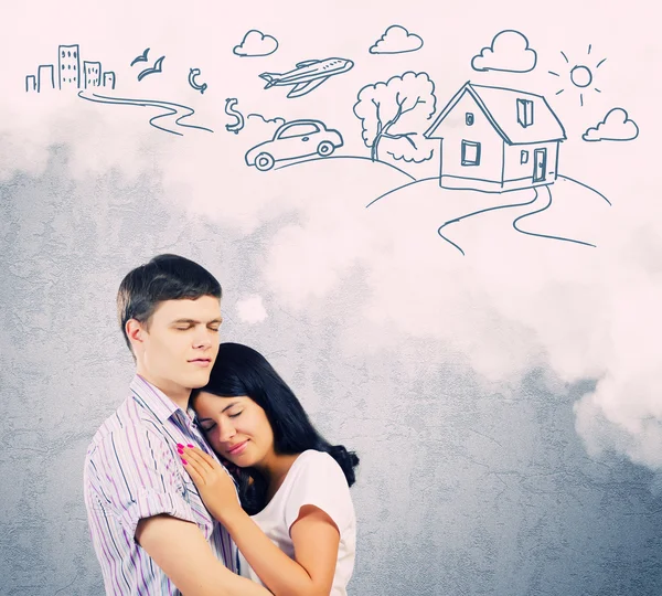 Young couple hugging each other — Stock Photo, Image