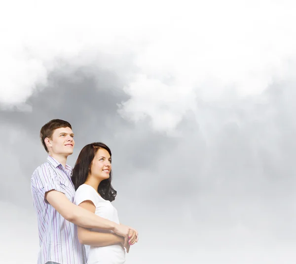 Young couple hugging each other — Stock Photo, Image