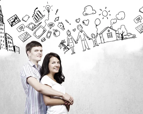 Young couple hugging each other — Stock Photo, Image