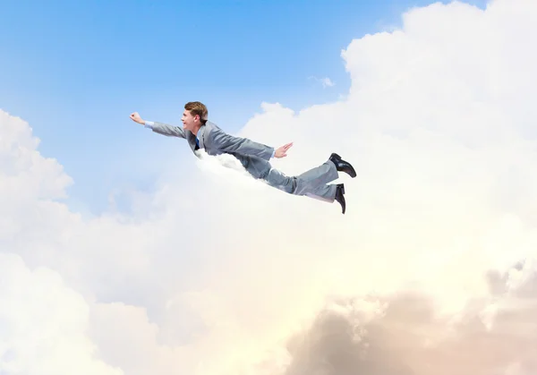 Flying businessman — Stock Photo, Image