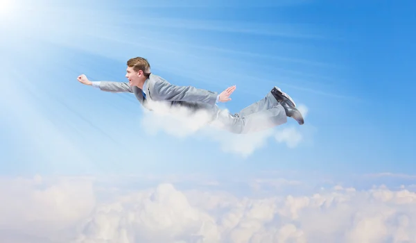 Flying businessman — Stock Photo, Image