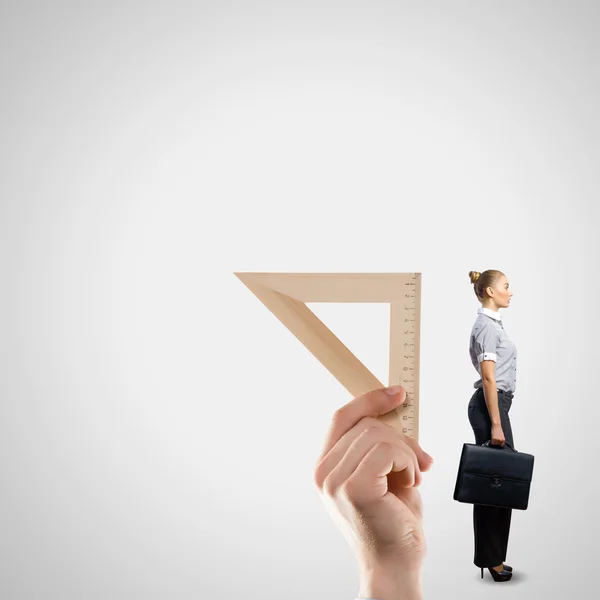 Business lady measuring — Stock Photo, Image