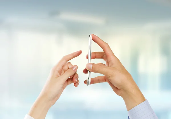 Hands using mobile phone — Stock Photo, Image