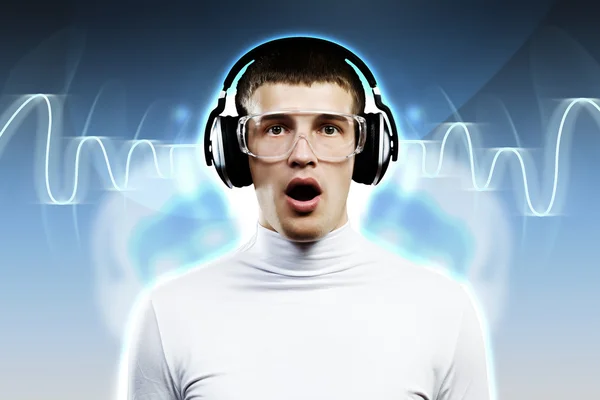 Young man wearing headphones — Stock Photo, Image