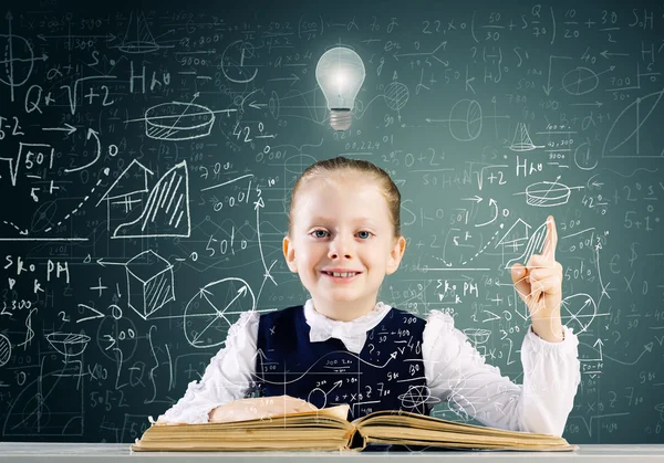 Schoolgirl having idea — Stock Photo, Image