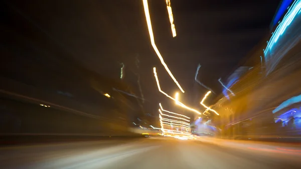 City lights and moving cars — Stock Photo, Image