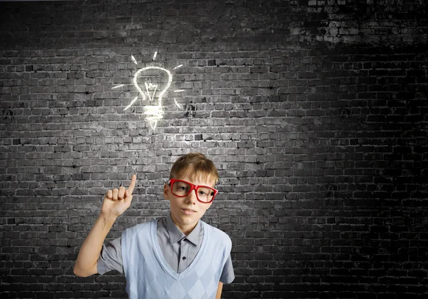 Schoolboy having idea — Stock Photo, Image