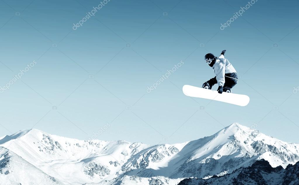 Snowboarder making jump