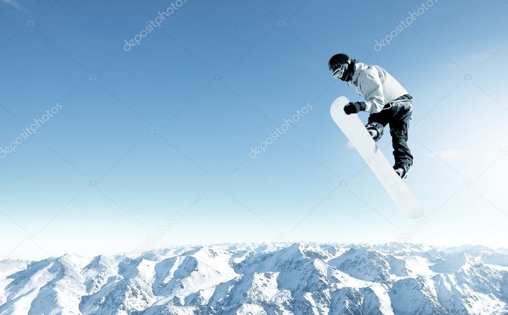 Snowboarder making jump