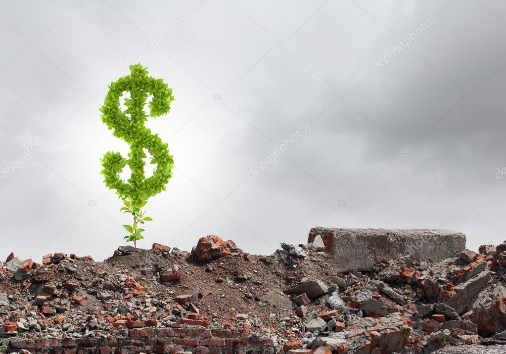Dollar sign growing on ruins