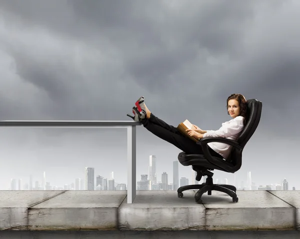 Young businesswoman with book — Stock Photo, Image