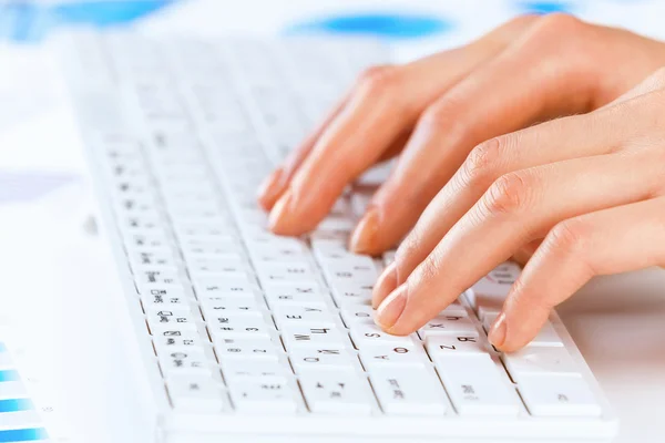 Hands typing on keyboard — Stock Photo, Image